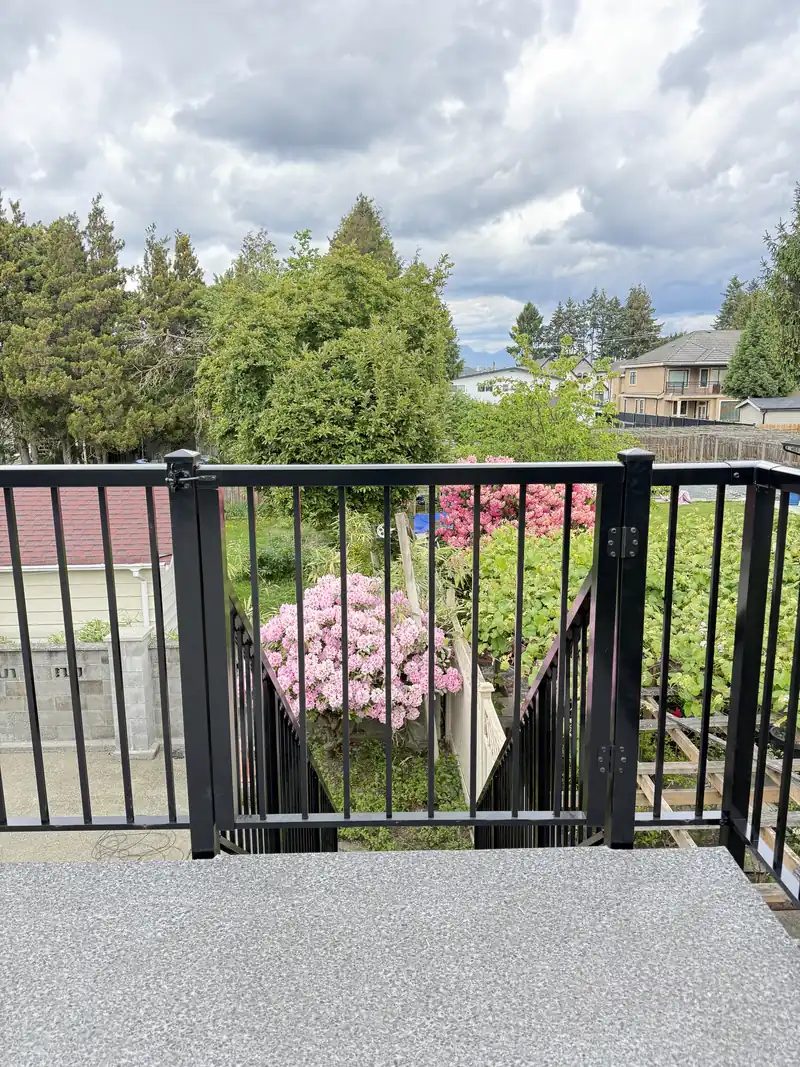 Picket gate at the top of a deck stair